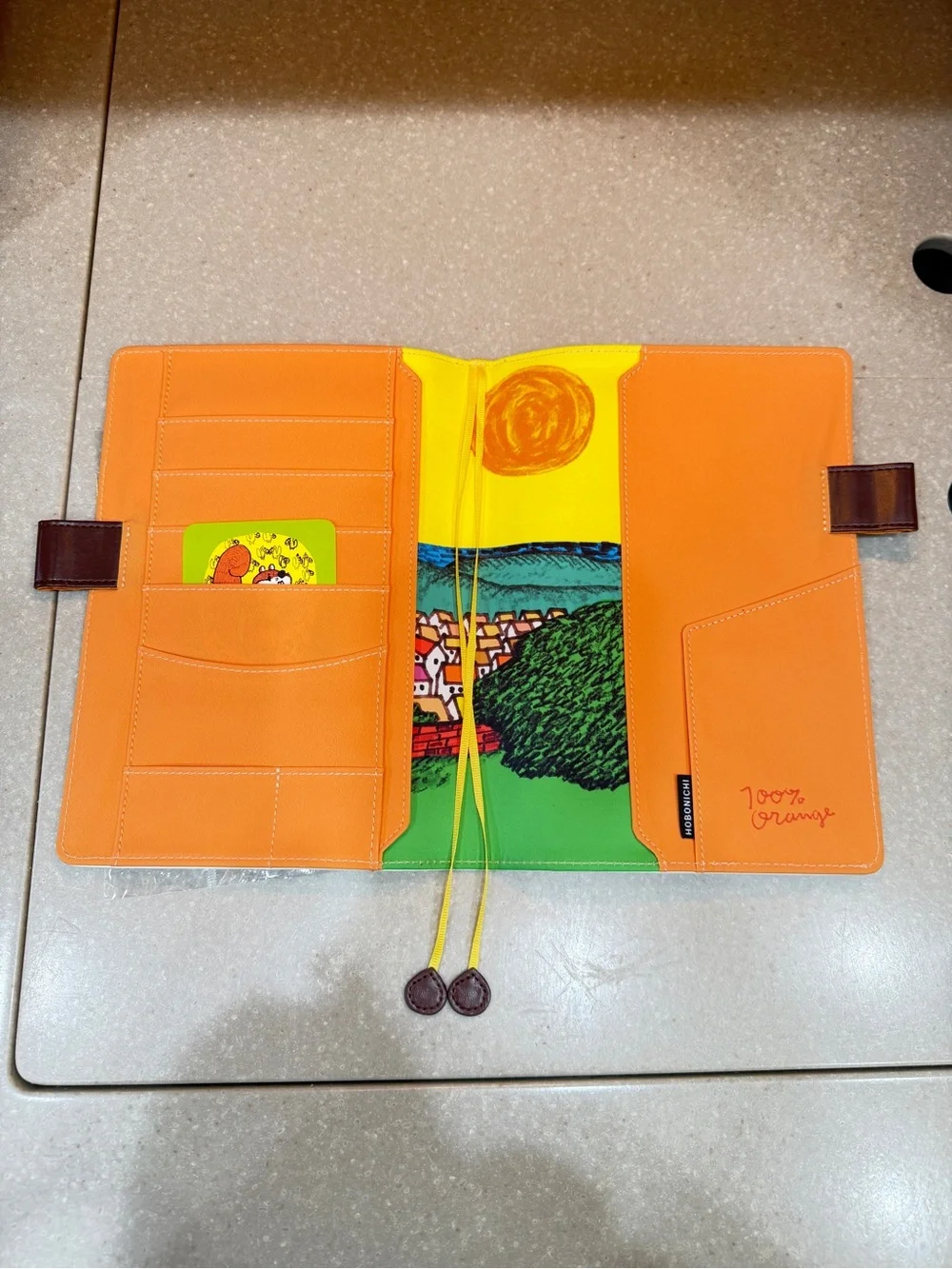 Hobonichi Cousin Cover.  100% orange: Where’s the squirrel going?